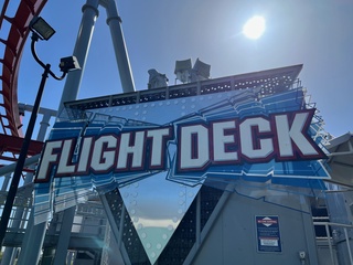 Entrance sign for the Flight Deck roller coaster
